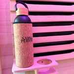 Water bottle sat on top of cup holder
